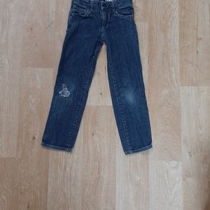 Blue jeans single rip in knee